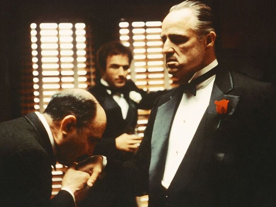 From left to right, Salvatore Corsitto as Bonasera, James Caan as Santino 'Sonny' Corleone and Marlon Brando as Don Vito Corleone in 'The Godfather'.