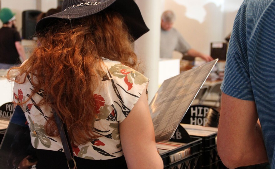 Lauren Keister, a 23-year-old anthropology junior at UF, eyes a copy of Amy Winehouse’s sophomore album, Back To Black, on vinyl.