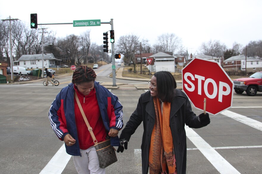 Tiffany Anderson (right), superintendent of the Jennings School District in north St. Louis County, Mo., performs crosswalk duty every morning to save the district money.