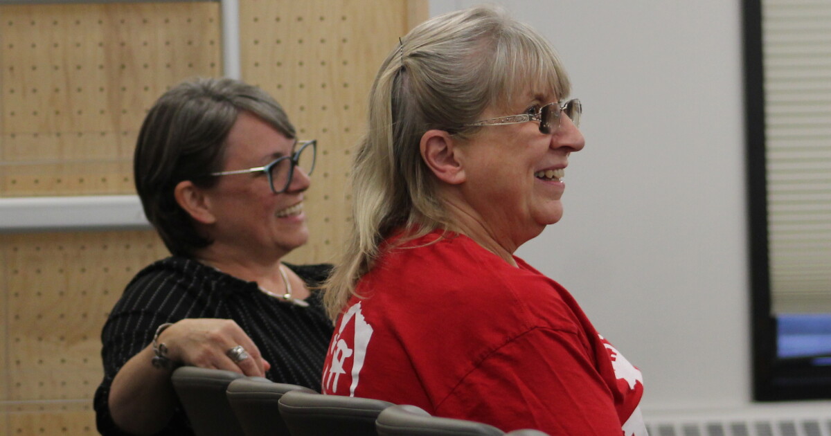 Susanna Litwiniak (left) and Annette Weigle (right) attend a Kenai Peninsula Borough School District school board meeting on Monday, Sept. 14, 2026 in Soldotna, Alaska.
