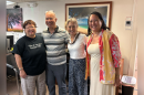 HPR's Valerie Yee (left) and Sharene Taba (right) with Herb and Kaori Mahelona (center).