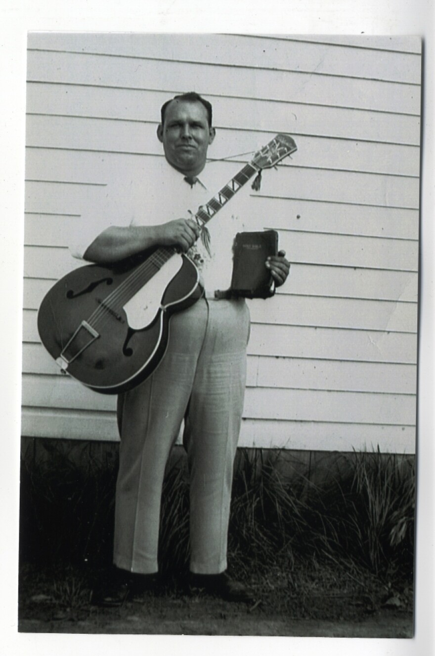 Brother Claude Ely, pictured in 1953 in front of the Letcher County Courthouse in Whitesburg, Ky.