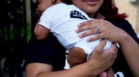 Arion D. Moore-Smith holds her son, Aamari, who was born during the Covid-19 pandemic. New Orleans, Louisiana, June 5, 2020.