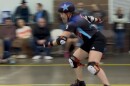 A member of the Des Moines Roller Derby serves as the team's "jammer," a player who serves as the team's primary scorer, marked by a star on their helmet. To score, the jammer must race through a pack of "blockers" and lap players on the opposing team.