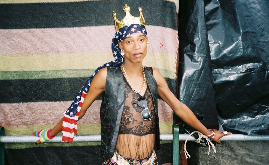 A transgender woman who goes by the name Cleopatra wears an outfit created from found objects and garments.
