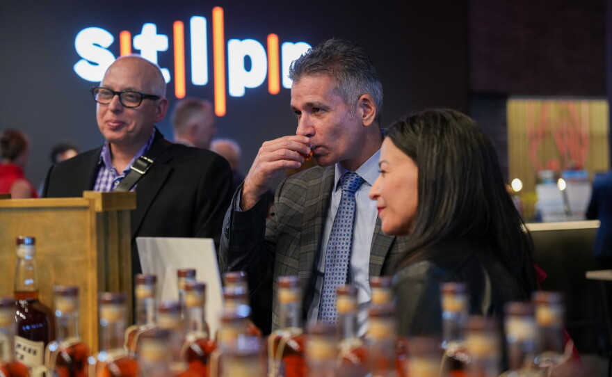 2026 Hear the Future guests sample a collection of whiskey samples.