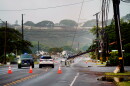 Downed power lines caused by Hurricane Lowell are seen across a road Tuesday, Sept. 8, 2026, in Hanapēpē, Kauaʻi, Hawaiʻi.