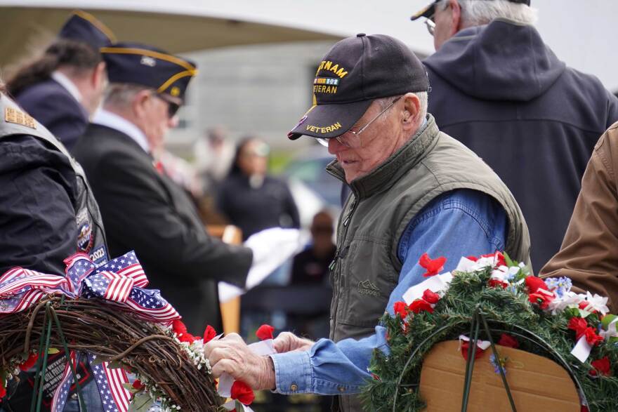 Red poppies are affixed to wreathes during a Memorial Day ceremony at Leif Hansen Memorial Park in Kenai, Alaska, on Monday, May 25, 2026.