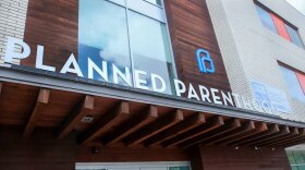 A building. The sign over the doors reads "Planned Parenthood."