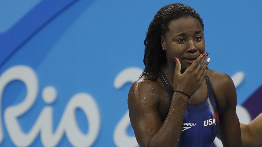 Simone Manuel won the gold medal in the women's 100-meter freestyle Thursday, becoming the first African-American to win an individual gold in swimming.