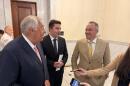 Mass. House Speaker Ron Mariano, Rep. Jack Patrick Lewis, and House Ways and Means Chair Aaron Michlewitz (pictured from left) gather to talk to reporters after a House Democrat caucus on July 15, 2026 at the State House. 