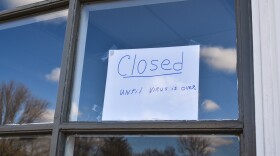 'Closed' sign on store window