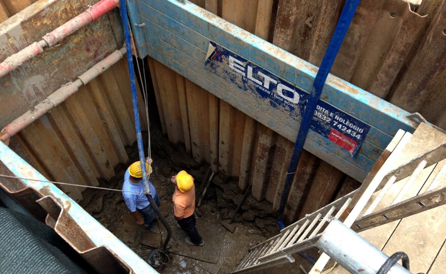 The Sant'Omobono excavation team dug a 15-foot reinforced hole below the water line.