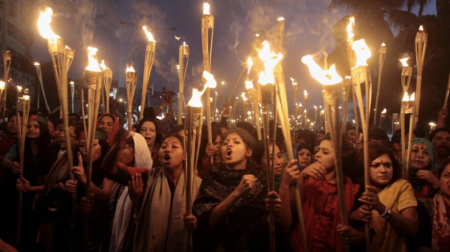 Bangladeshi activists participate in a rally Thursday in the capital, Dhaka, celebrating the Supreme Court's decision to clear the way for the execution of Jamaat-e-Islami leader Abdul Quader Mollah. Mollah was hanged Thursday for crimes committed during the country's 1971 war of independence.