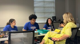 Brooke Hamlett works with students at the Teacher Prep Academy on Thursday, June 5, 2025 in Indianapolis. The program aims to help high schoolers explore possible careers in teaching through dual-credit courses, and by living on the University of Indianapolis campus for a week.