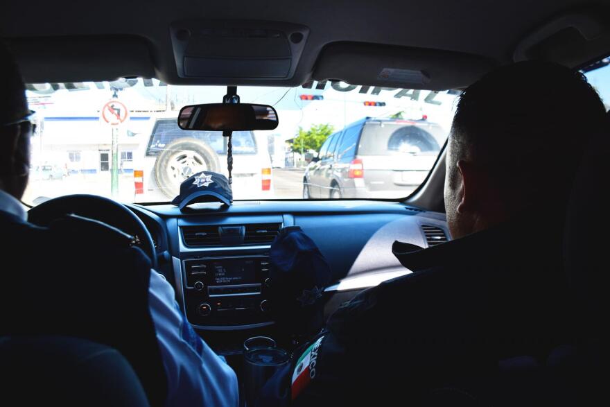 Hermosillo Transit Police Captain Luis Moreno (left) heads toward a traffic accident in Hermosillo on Jan. 22, 2020.
