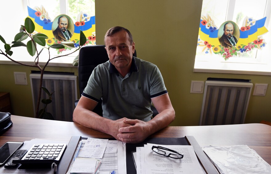 Mykola Dyachenko is a local administrator in Nova Basan. There is still a bullet hole in his office from the Russian invasion.