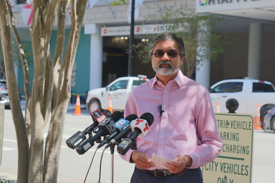 City of Tampa Mobility Director Vik Bhide announcing the e-vehicle docking station initiative at April 1st press conference.