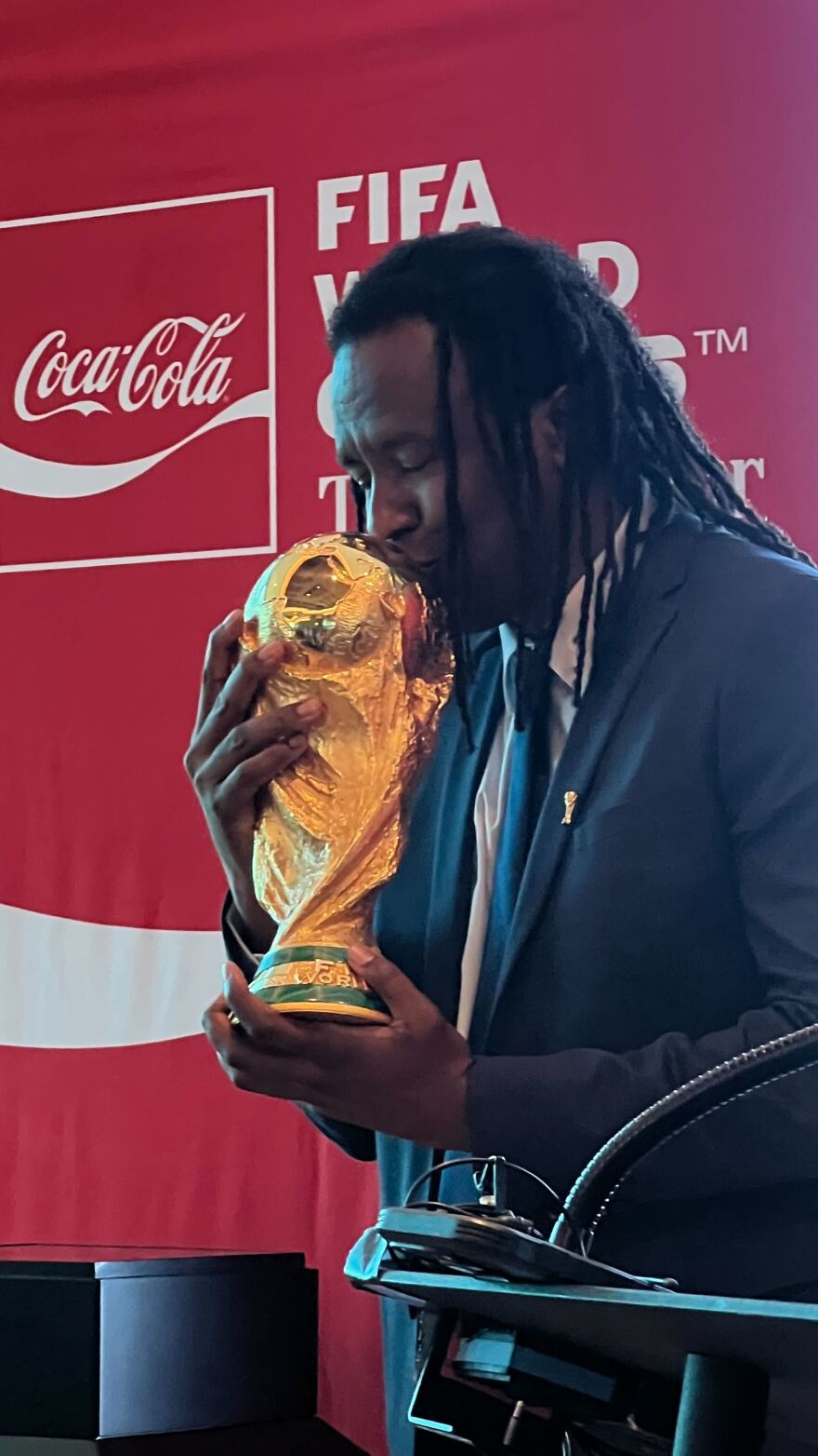 Roque Júnior, a member of the World Cup-winning 2002 Brazil team, has a reunion with the World Cup trophy at a press conference at Westport Plaza on Thursday.