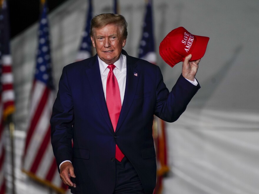 Former President Trump arrives at a rally Friday, Aug. 5, in Wisconsin. Trump has been the subject of several ongoing investigations into his businesses and actions while in the White House. [Morry Gash / AP]