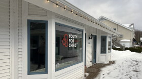 A building owned by Apollos Properties overlooking Leland’s historic Fishtown sits empty pending a federal lawsuit over Youth for Christ’s desire to open a youth ministry in the commercially zoned business district. (Photo: Jacob Wheeler/Glen Arbor Sun)