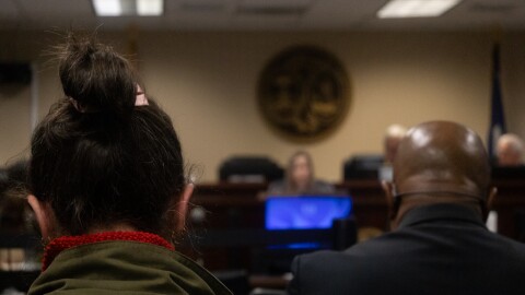 Dominion Energy customers sit at a public hearing located at the Public Service Commission's Hearing Room in Columbia.