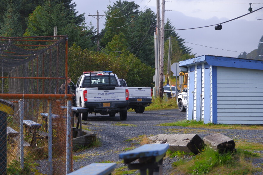 State troopers and Kodiak police park in front of the softball field on Mill Bay Road on Sept. 25.