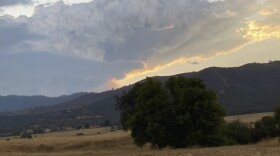 Smoke rises from the Head Fire in Klamath National Forest, Calif., on Tuesday Aug. 15, 2023.