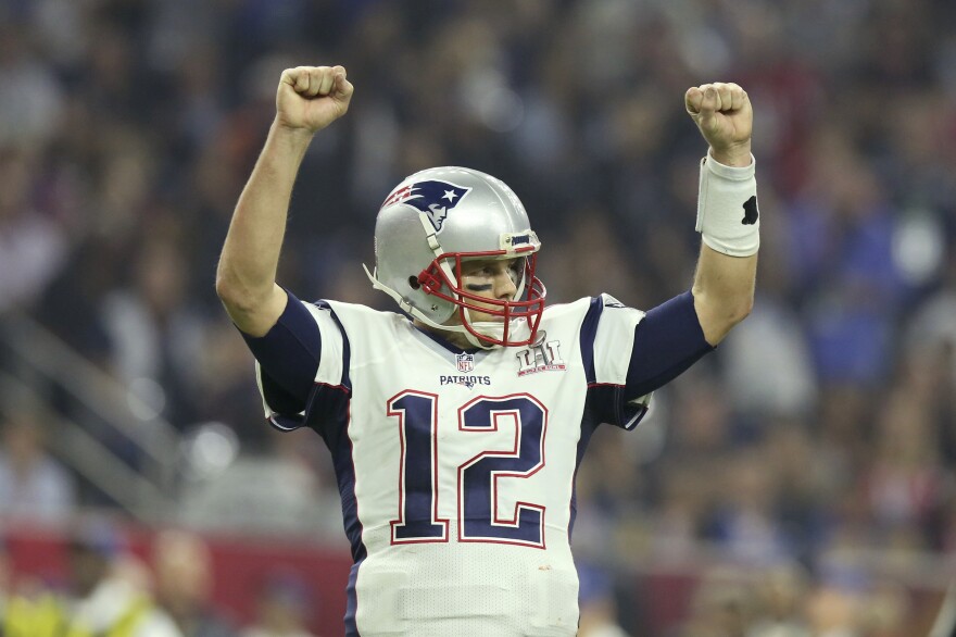 New England Patriots quarterback Tom Brady celebrates a touchdown against the Atlanta Falcons during Super Bowl 51 in Houston.