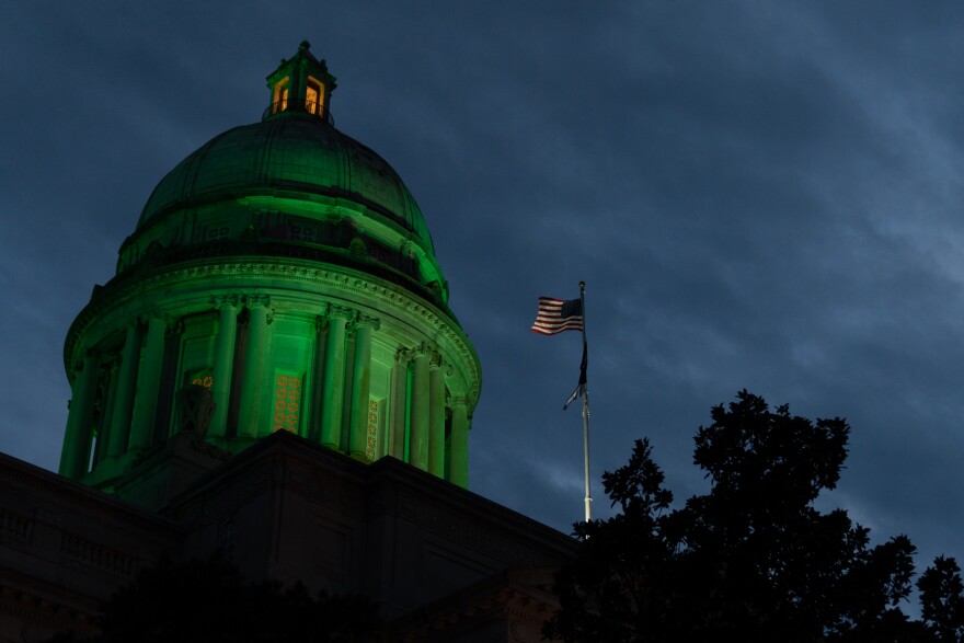 The Kentucky State Capitol on 4/9/20, lit up green in memory of those who died from COVID-19.