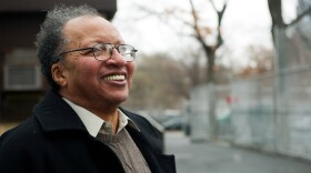 Author Walter Dean Myers tours his old Harlem neighborhood in New York in 2010.
