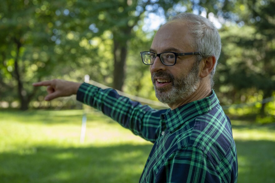 Dr. Cary Gross, a longtime Woodbridge resident, shows off his large, open yard, which he says was a major selling point for his family. He is a plaintiff in a lawsuit that claims his town's exclusionary zoning is discriminatory and breaks several laws.