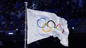The Olympic flag flies during the closing ceremony of the 2022 Winter Olympics, Sunday, Feb. 20, 2022, in Beijing.