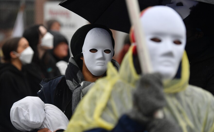 Protesters march outside the Scranton Army Ammunition Plant on Sunday, Dec. 3.