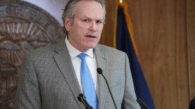 Gov. Mike Dunleavy speaks to reporters during a news conference on April 17, 2025.