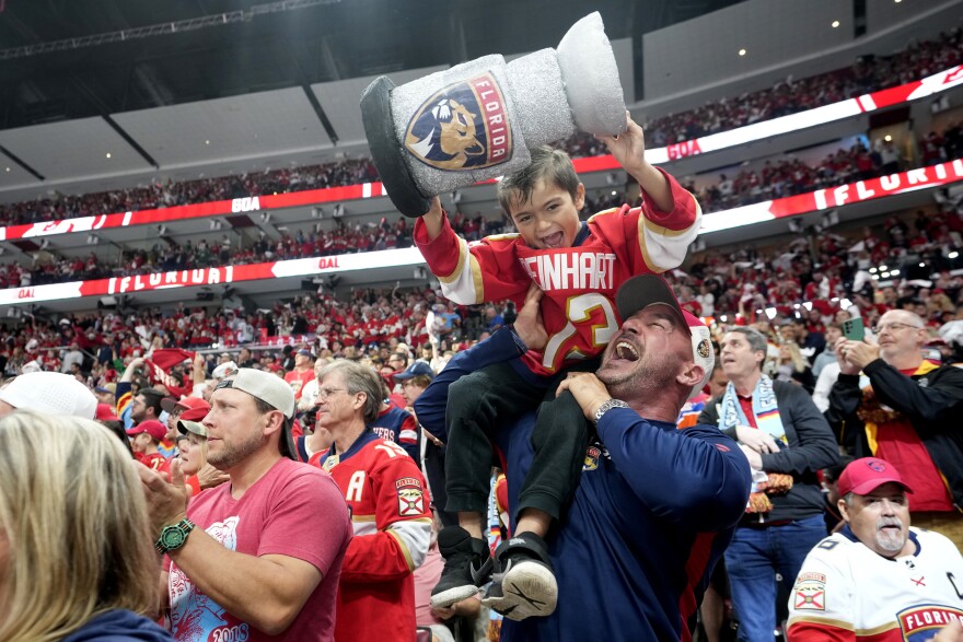 Florida Panthers fans cheer during the first period of Game 1 of the team's NHL hockey Stanley Cup Finals against the Edmonton Oilers, Saturday, June 8, 2024, in Sunrise, Fla. (AP Photo/Wilfredo Lee)