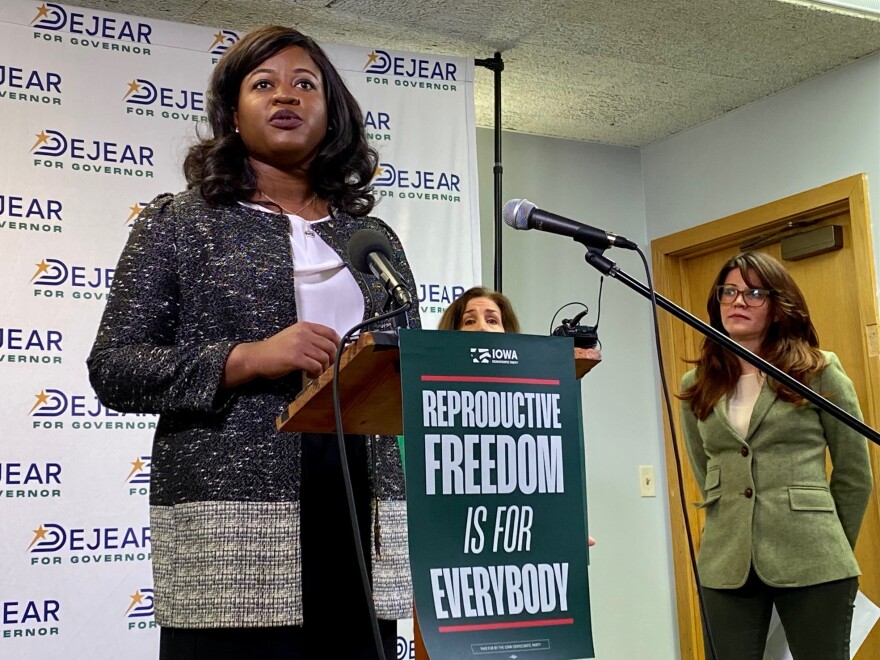 Democratic candidate for governor Deidre DeJear speaks at a news conference