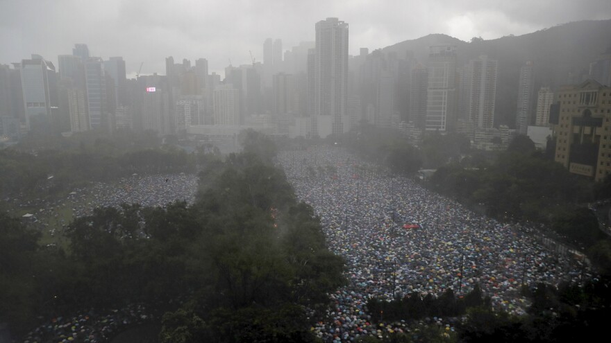 Protesters gather in Hong Kong's Victoria Park on Sunday.