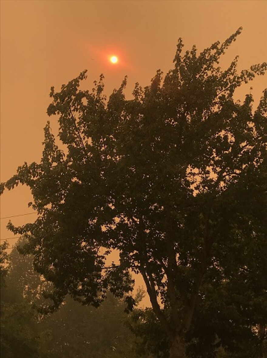 The early afternoon sun burns bright orange in the smokey, ash filled sky over South Eugene on September 8, 2020.