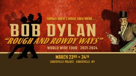 A dancing couple and a skeleton in a top hat.