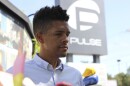 Brandon Wolf, a survivor of the Pulse nightclub shooting and activist, stands outside of the Pulse memorial in Orlando, Fla., on Sept. 9, 2022. After mass shootings, the loss felt by marginalized groups already facing discrimination is compounded. Some public health experts say the risk for post-traumatic stress disorder is greater for the groups, especially when the shootings take place at schools, churches and other vital hubs.