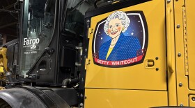 Snow plow displaying winning name, "Betty Whiteout."