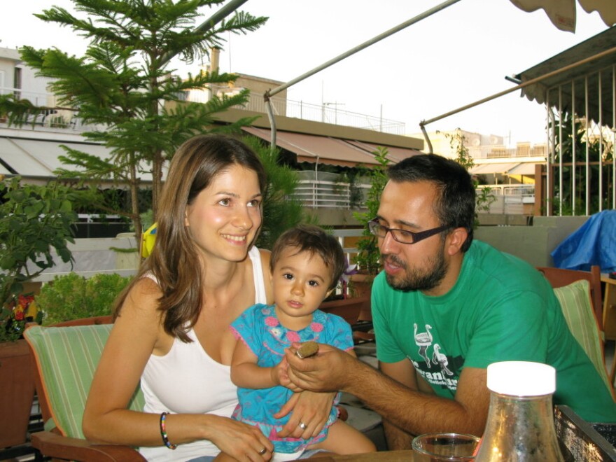 Stella Kasdagli and Alexandros Karamalikis live with their 13-month-old daughter, Stefania, in a middle-class neighborhood in Athens. They say Greece's latest emergency tax measure will force them to dip into their savings.