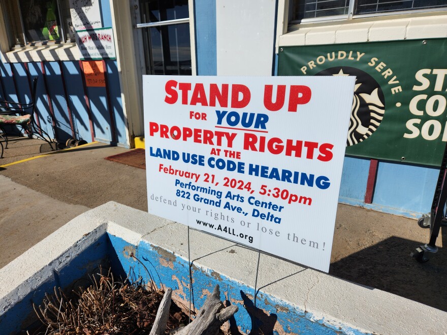 Land Use Code Hearing Sign at Rogers Mesa Store