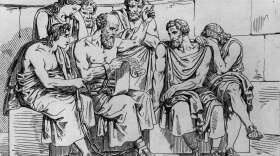 Circa 410 BC, The Greek philosopher Socrates (469 - 399 BC) teaches his doctrines to the young Athenians whilst awaiting his execution. Original Artwork: An engraving after a painting by Pinelli. (Hulton Archive/Getty Images)