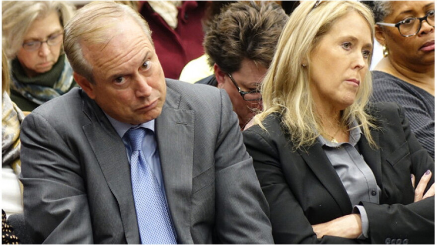 Jon Hage, CEO of Charter Schools USA, and Sherry Hage, CEO of Noble Education Initiative, listen to members of the Indiana Charter School Board at a meeting Friday, Dec. 13, 2019