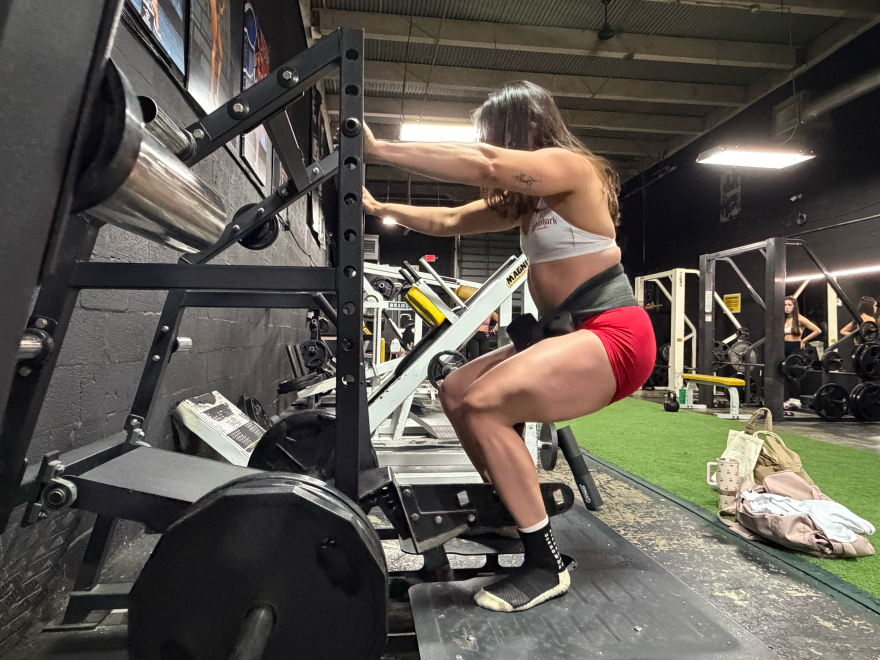 Lilian Zamora Alonso training with a belt squat machine on Sept. 25, 2026 in Kendall, Florida.
