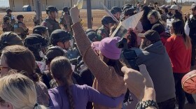 Protesters clash with Texas DPS outside the Dilley immigration detention center, Jan. 28, 2026.