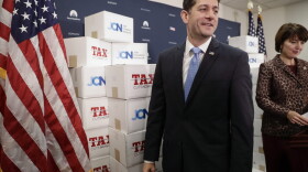 Speaker of the House Paul Ryan, R-Wis., followed at right by Rep. Cathy McMorris Rodgers, R-Wash., walks past boxes of petitions supporting the Republican tax reform bill that is set for a vote later this week as he arrives for a news conference on Capitol Hill in Washington, Tuesday, Nov. 14, 2017. (J. Scott Applewhite/AP)