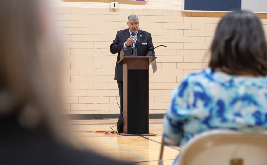 Wichita Public Schools Deputy Superintendent Gill Alvarez speaks to guests at the start of the event on March 26. Alvarez was a former principal at Northeast.